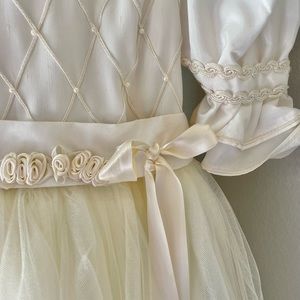 Formal cream dress (flower girl) with pearl buttons and tulle skirt—size 10